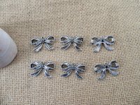 100Pcs New Bowknot Beads Charms Pendants Jewellery Findings 100Pcs New Bowknot Beads Charms Pendants Jewellery Findings