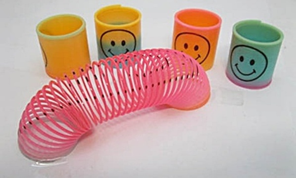 60Pcs Smile Face Slinky Rainbow Spring Great Toy - Click Image to Close