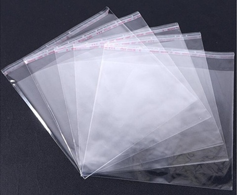 100 Clear Self-Adhesive Seal Plastic Bags 31x35cm - Click Image to Close