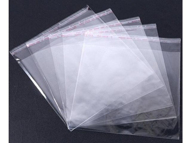 100 Clear Self-Adhesive Seal Plastic Bags 31x35cm - Click Image to Close