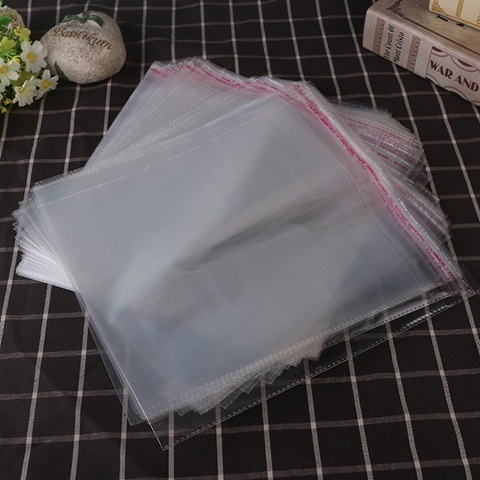 200 Clear Self-Adhesive Seal Plastic Bags 27x28cm - Click Image to Close