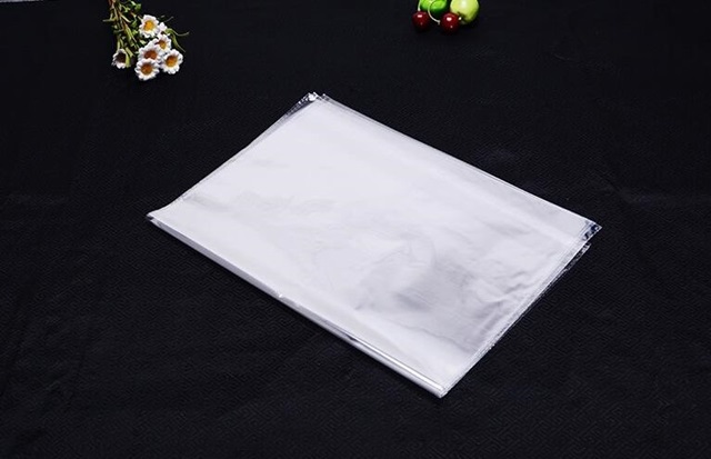 500 Clear Self-Adhesive Seal Plastic Bag 59x40cm - Click Image to Close