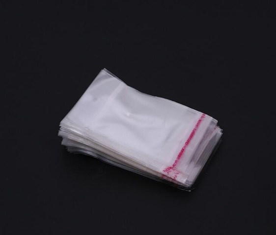 1000 Clear Self Adhesive Seal Plastic Bag with Hanging Hole 10x5 - Click Image to Close