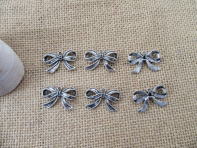 100Pcs New Bowknot Beads Charms Pendants Jewellery Findings 100Pcs New Bowknot Beads Charms Pendants Jewellery Findings