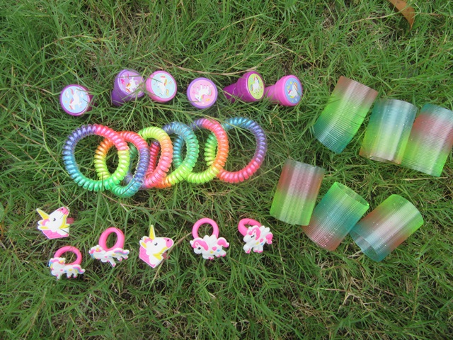 24Pcs Rainbow Slinky Bracelet Stamps Rings Loot Bags Toy - Click Image to Close